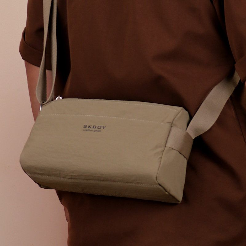 男士斜挎包休闲牛津布小包2025新款大容量单肩包男款高级感便携包,淘宝优惠券,粉丝福利购,淘宝优惠卷