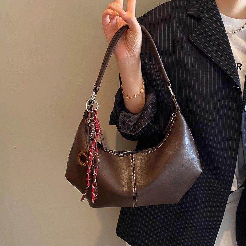 真皮复古大容量斜挎包包女2025新款时尚牛角包简约休闲单肩腋下包,淘宝优惠券,粉丝福利购,淘宝优惠卷