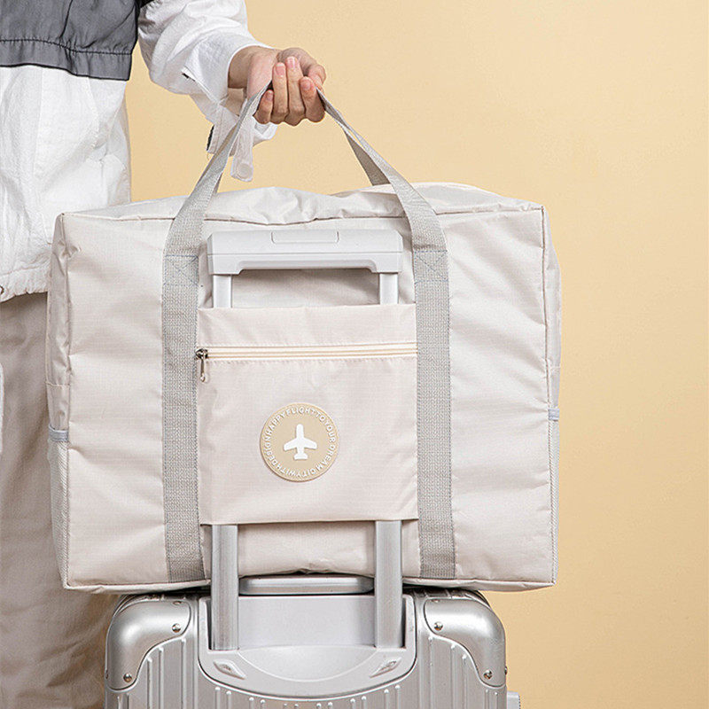 手提旅行登机包大容量防水简约轻便携折叠短途行李袋子套拉杆箱包,淘宝优惠券,粉丝福利购,淘宝优惠卷