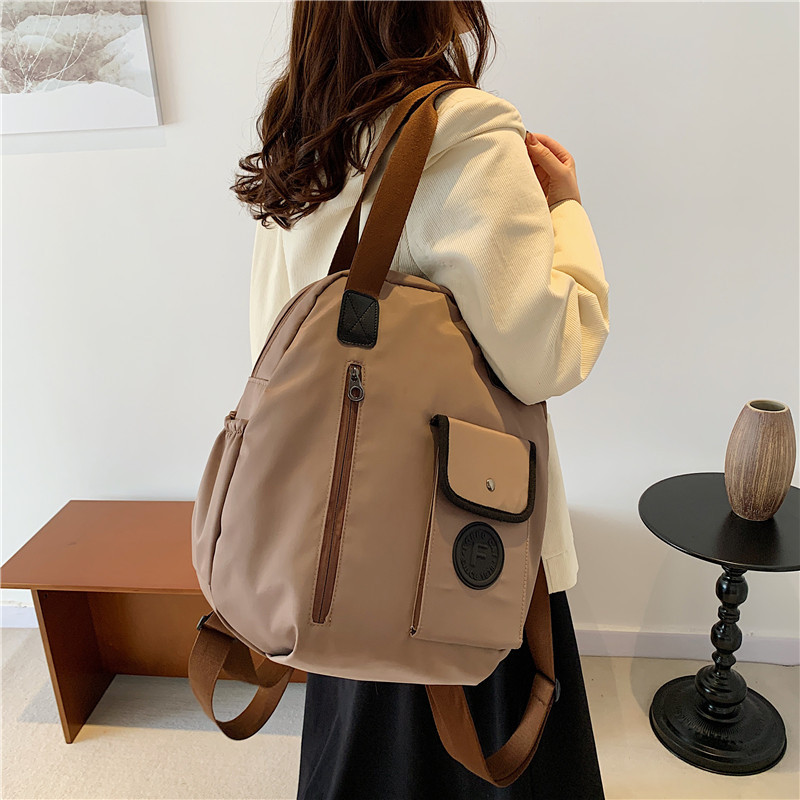 双肩包女2025春秋新款超大容量手提单肩撞色旅行包通勤休闲托特包,淘宝优惠券,粉丝福利购,淘宝优惠卷
