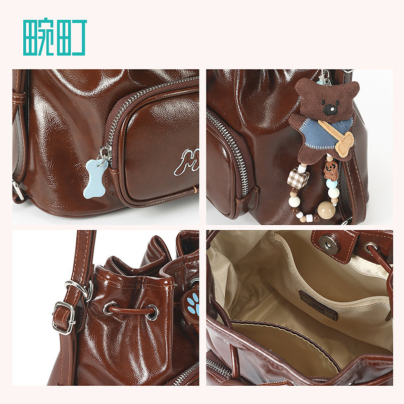 畹町焦糖可露丽油蜡皮包女秋冬复古蓝棕单双肩通勤女包抽绳水桶包,淘宝优惠券,粉丝福利购,淘宝优惠卷