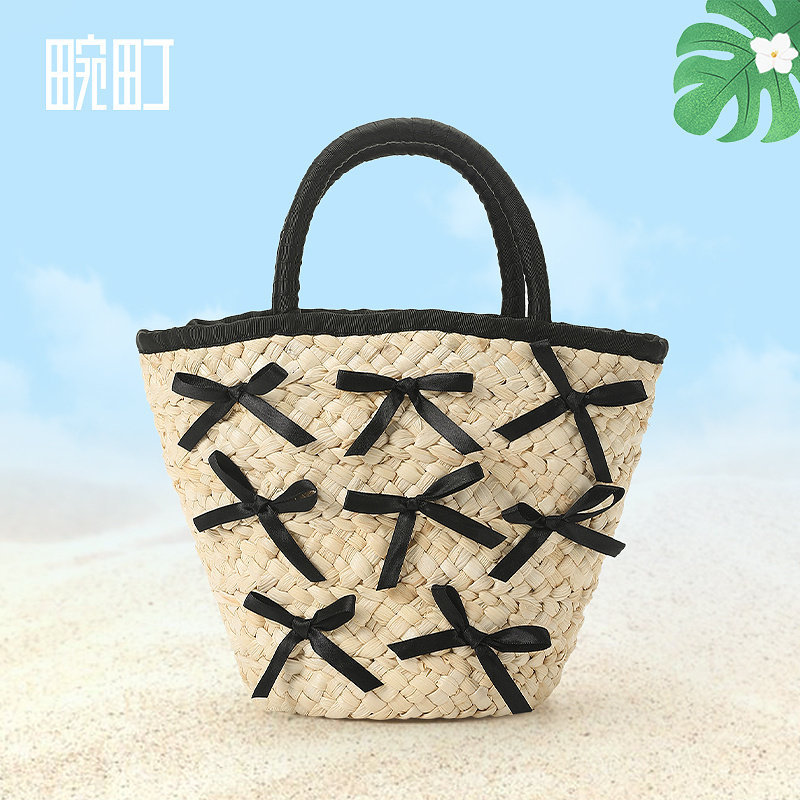 畹町度假系列手提草编包女夏季海边旅游沙滩包包芭蕾蝴蝶结水桶包,淘宝优惠券,粉丝福利购,淘宝优惠卷