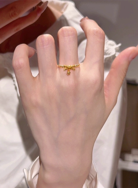 金色蝴蝶结仿蹦迪珠流苏戒指