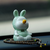 Green porcelain slats on a small rabbit swing piece cute and playful Jade Rabbit mascot Creative Desktop Furnishing On-board Decorations