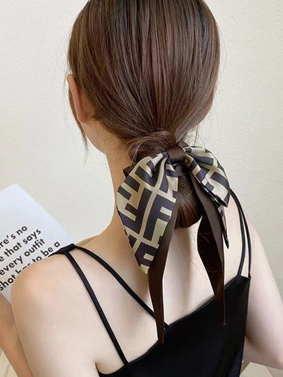 2025 internet celebrity hot style bande de cheveux streamer bandeau femme foulard en soie haut de gamme noeud papillon bandeau à moitié noué accessoires pour cheveux