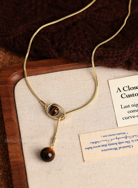 诗娱2026新款秋冬虎眼石抽拉项链女美拉德长款配饰轻奢高级毛衣链