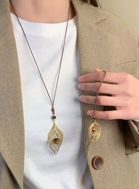 拉德金色虎眼石长款项链女款轻奢高级毛衣复古装饰配饰吊坠