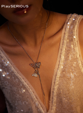 MFOW不对称镂空两个蝴蝶长项链