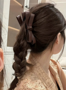 黑色皮质金标蝴蝶结发夹女后脑勺