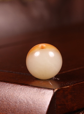 新疆和田玉籽料红皮珠子