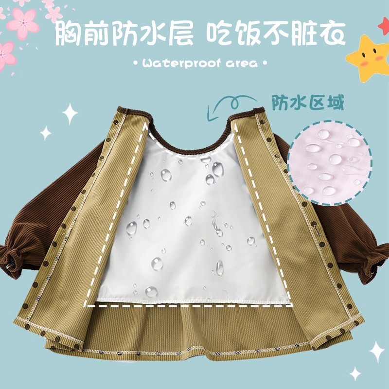 Baby girl wears princess skirt and bib outside eating blouse