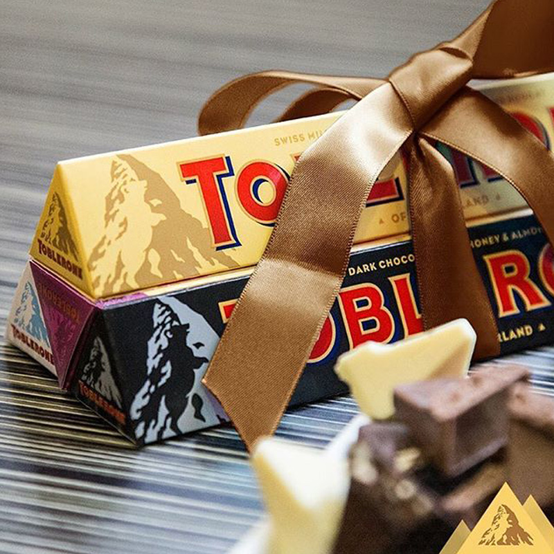 亿滋Toblerone三角100g*4条装葡萄干巧克力白巧克力进口零食糖果
