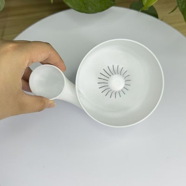 Multifunctional automatic rinsing fruit and vegetable drain basket