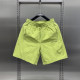 Pantalon d'été et pantalon de quart de doigts pour hommes minces et à la mode shorts décontractés beaux et polyvalents pantalon de plage de couleur unie à la mode à la mode