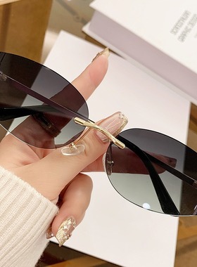 欧美时尚甜酷辣妹miu墨镜曲面凸造型金属无框切边太阳镜防紫外线