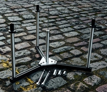 Colatable auxiliary tool to wear a spoke fixing table
