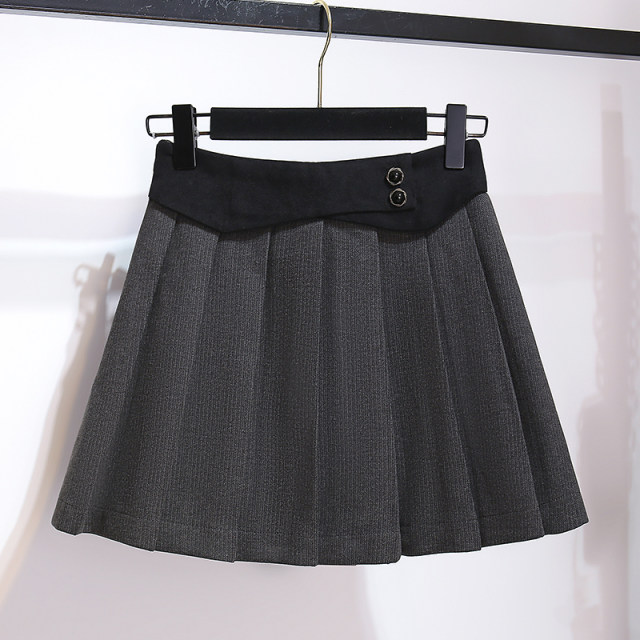 Short suit jacket with pleated skirt