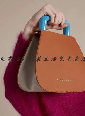 样板房玄关柜橙色卡其白色系现代简约软装组合整套摆件手表耳环