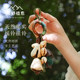 Natural fruit shell hand rattle clear spring stream water bag hanging