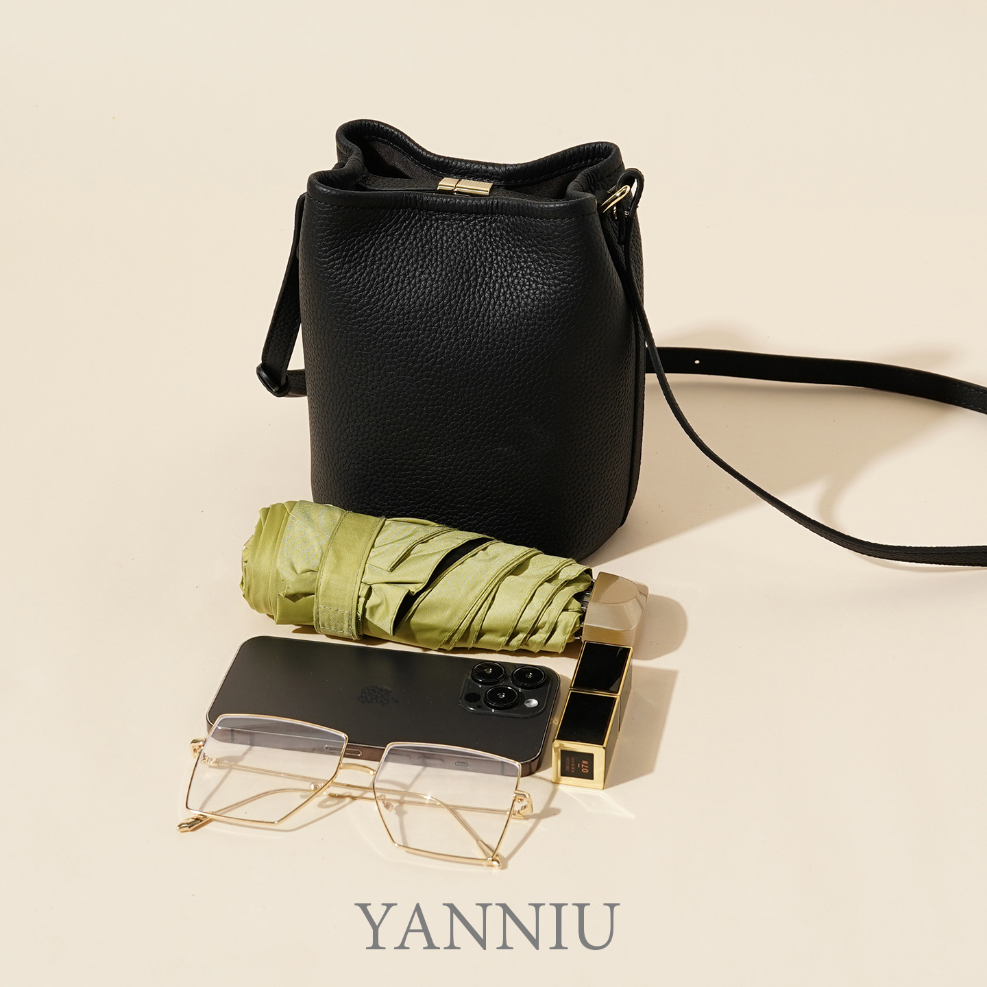 岩牛TC纹真皮手提水桶小包2025新款小众轻奢高级感斜跨软皮女款包 - 图2