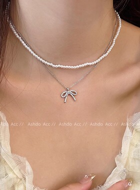 双层叠戴珍珠蝴蝶结项链女款2024新款轻奢小众锁骨链甜酷配饰颈链