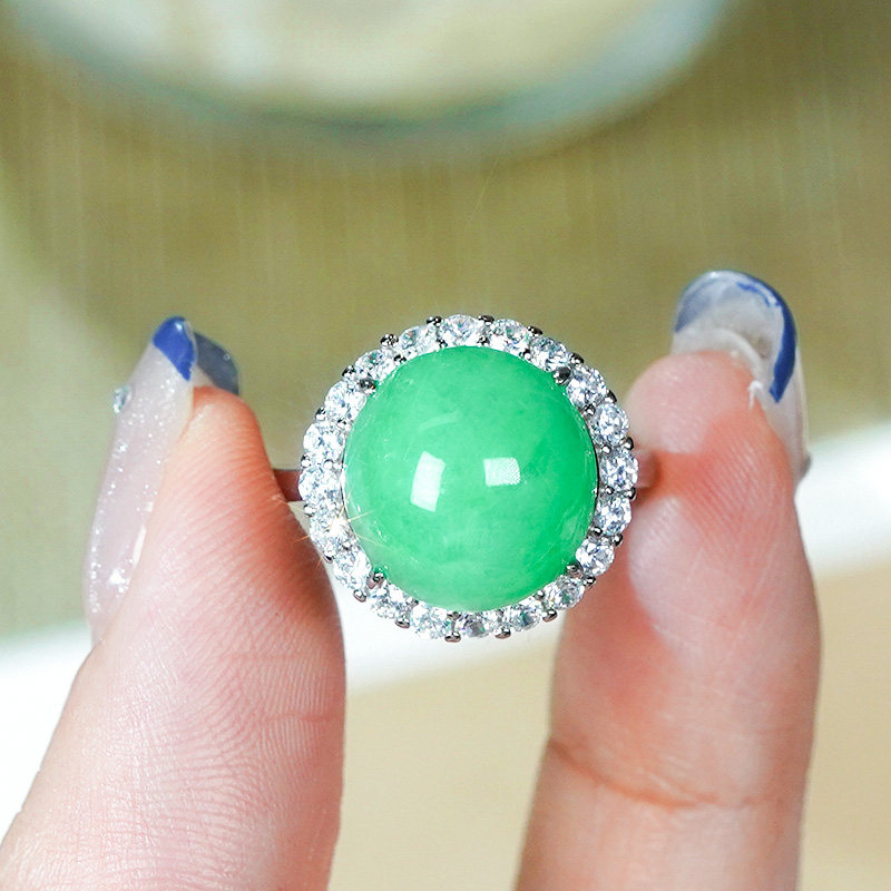 Natural Burmese jadeite ring A grade silver inlaid fashionable and elegant light green jadeite egg surface living ring