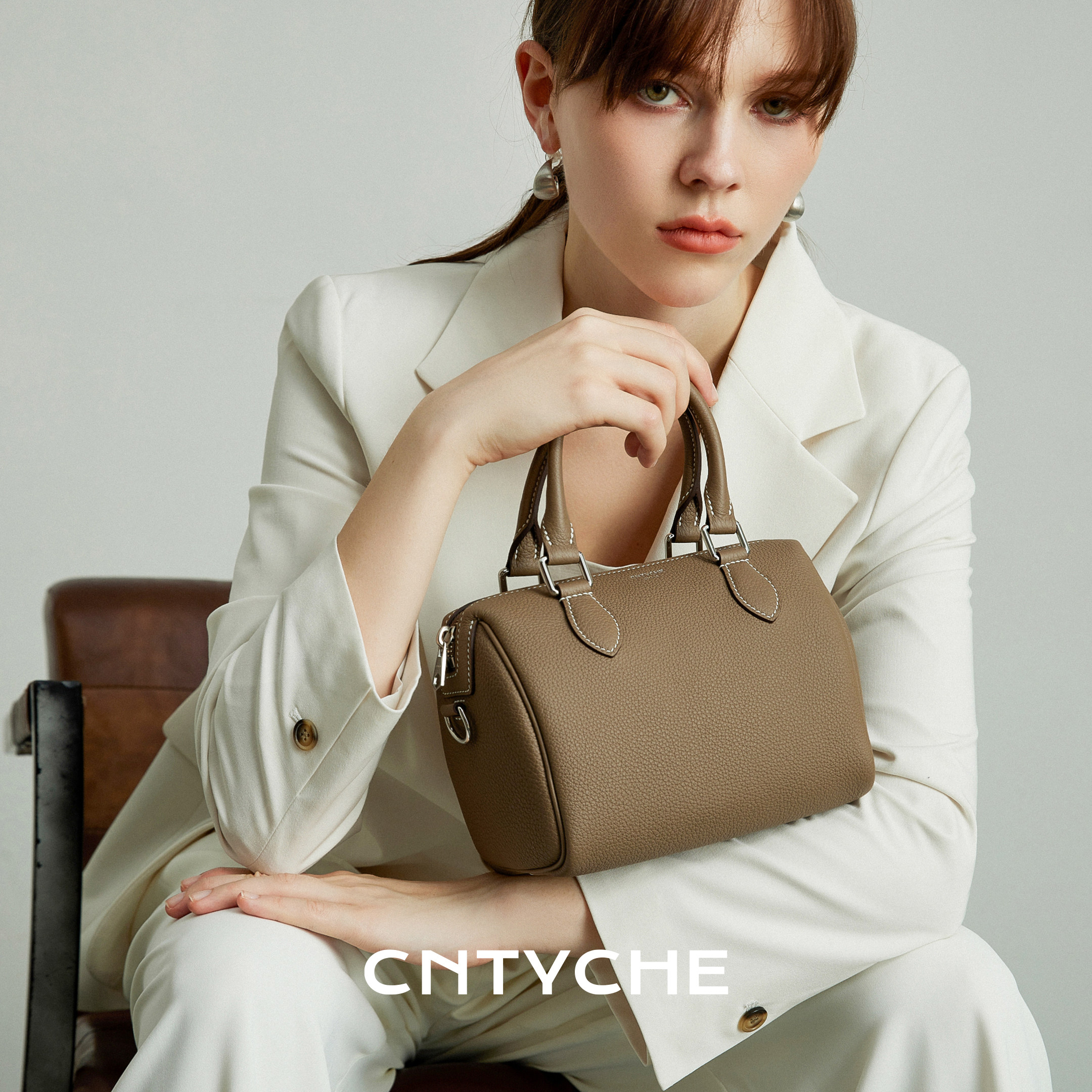 CNTYCHE/堤喀2026新款小号波士顿包进口TOGO皮单肩手提女包枕头包,淘宝优惠券,粉丝福利购,淘宝优惠卷