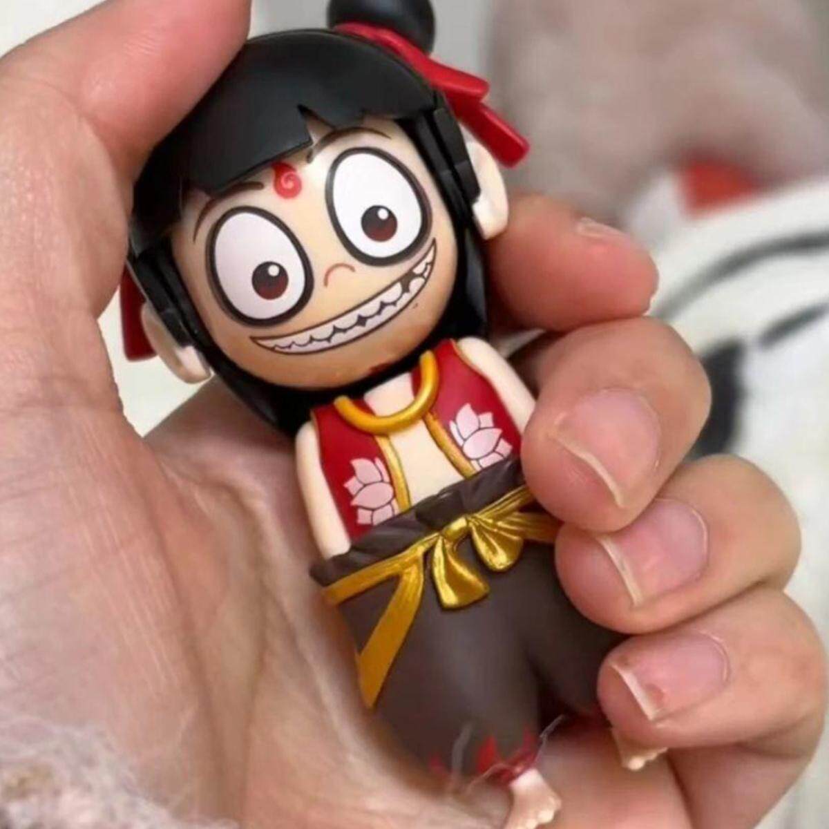 哪咤之魔童闹海变脸玩具哪吒表情包变脸按压变脸挂件摆件趣味创意