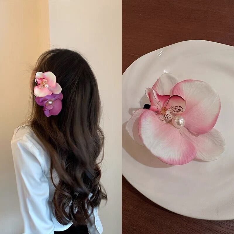 今世戴花蝴蝶结兰花朵边夹女氛围感拍照出片刘海夹海边度假头饰