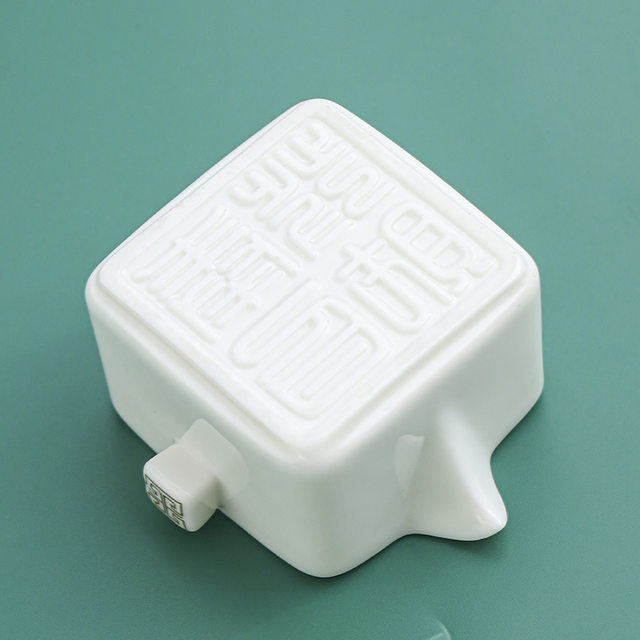 Suet-fat jade hand-grabbing pot for household high-end tea making special ceramic Kung Fu tea set tea water separation single pot 2026 new style