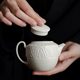 Ding kiln white teapot for tea making household high-end ceramic tea water separation small single pot kung fu tea set 2026 new style