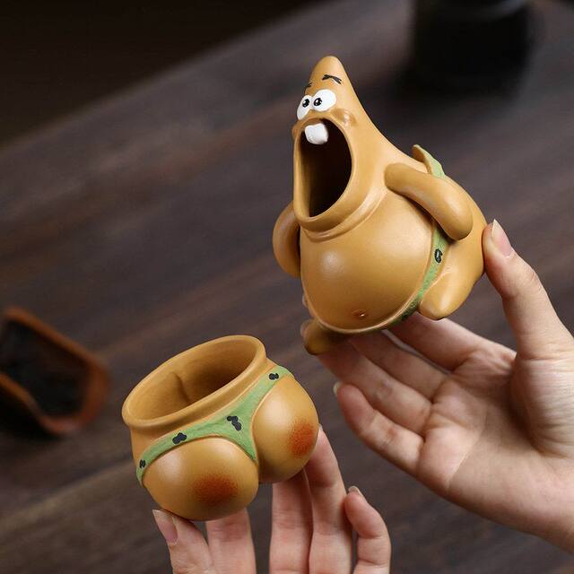 Handmade purple sand pot, fun and creative, big star hand-held pot, fair cup, butt cup, teapot, quick cup tea set