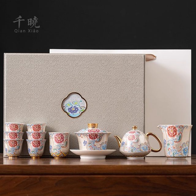 Handmade sterling silver filigree teapot and ceramic tureen