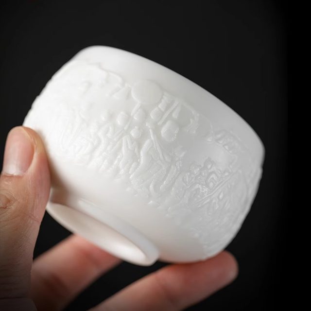 Ice jade porcelain relief Dunhuang master drinking tea cup mutton fat jade ceramic personal high-end white porcelain tea cup