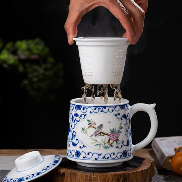 Jingdezhen blue and white ceramic tea cup tea water separation office filter porcelain cup with lid household single cup with handle