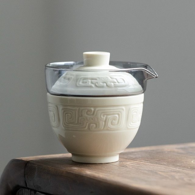 Imitation Song Dynasty Ding kiln white Taotie pattern quick cup hand-held pot tea cup set outdoor portable travel tea set for one person to drink