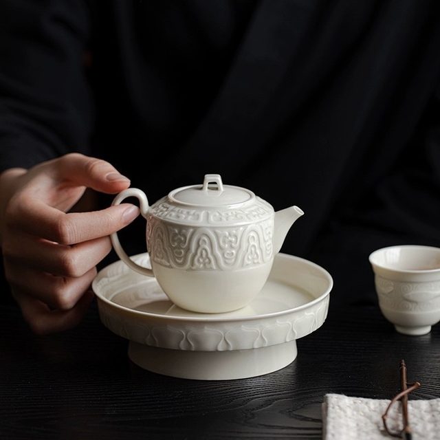 Ding kiln white teapot for tea making household high-end ceramic tea water separation small single pot kung fu tea set 2026 new style