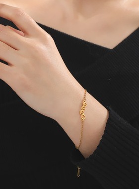 新款 一件包邮热销钛钢镂空连续兽脚印吊坠304材质不锈钢手链