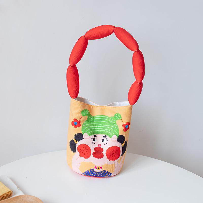 可爱卡通充棉手拎腋下包布包小众搞怪插画水桶包个性充棉肩带腋下,淘宝优惠券,粉丝福利购,淘宝优惠卷
