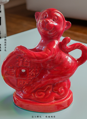 手抱铜钱小猴子陶瓷装饰品