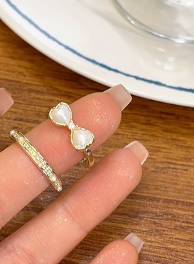 秋冬新款轻奢风仿珍珠蝴蝶结戒指女小众设计感精致时尚百搭食指戒