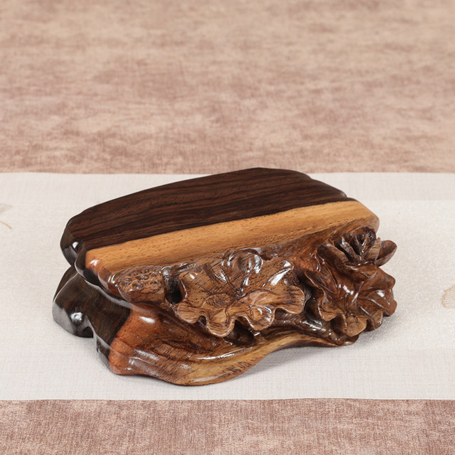 Ebony whole wood root carving with grooveable stone base