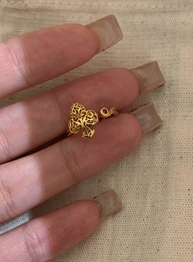 中古金色镂空神秘梅花尾戒女新款