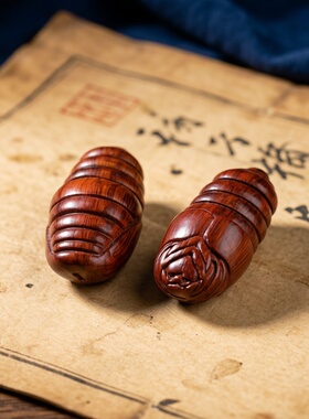犀牛角紫檀蚕蛹手工木头手把件