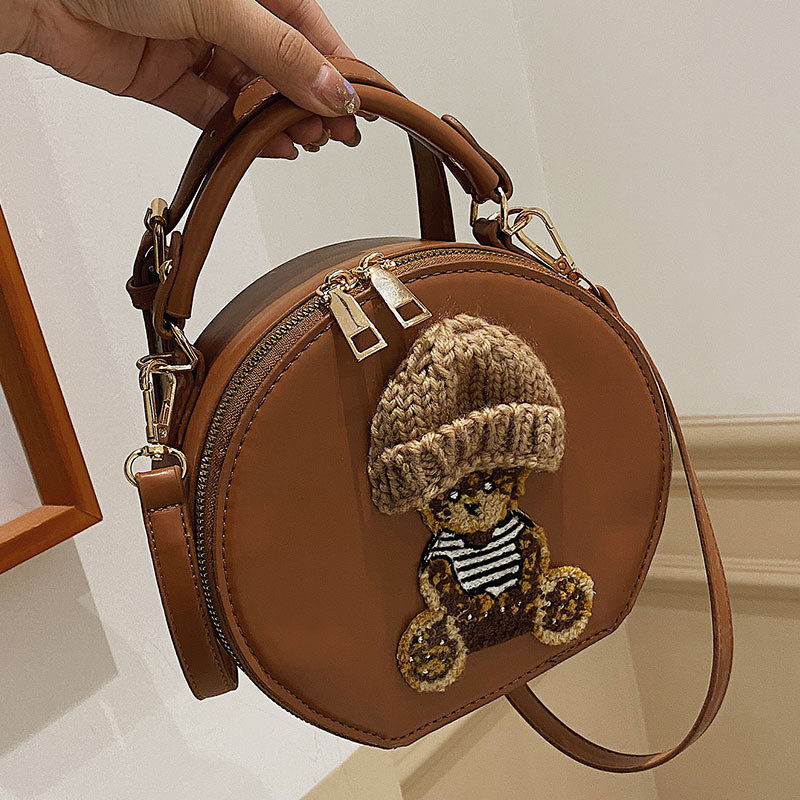 高级感可爱小众手提包包女春夏2025新款时尚少女斜挎包洋气小圆包,淘宝优惠券,粉丝福利购,淘宝优惠卷