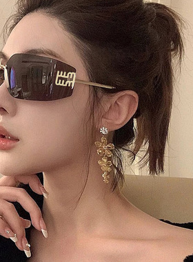 新款外贸无框曲面太阳镜女金属时尚潮流防紫外线眼镜网红墨镜
