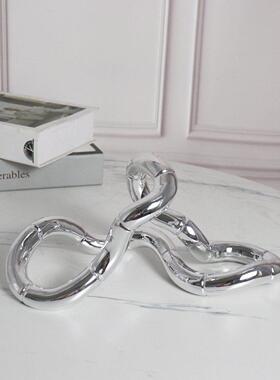 现代轻奢电视柜摆件家居客厅创意银色缠绕环形摆设样板间软装饰品