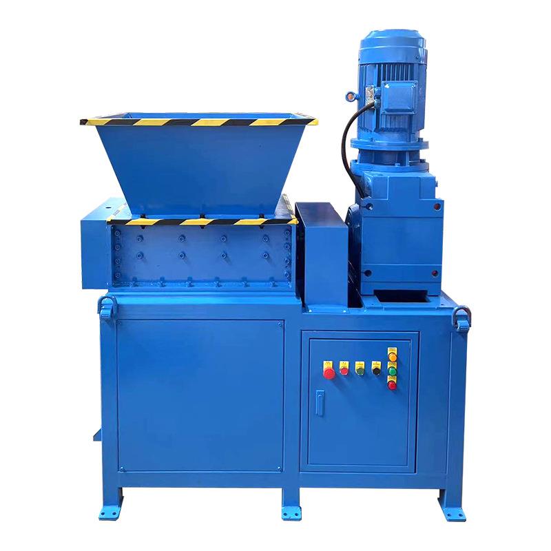 Large and small plastic wood double-shaft shredder metal scrap iron blue barrel head material tire garbage crushing chassis