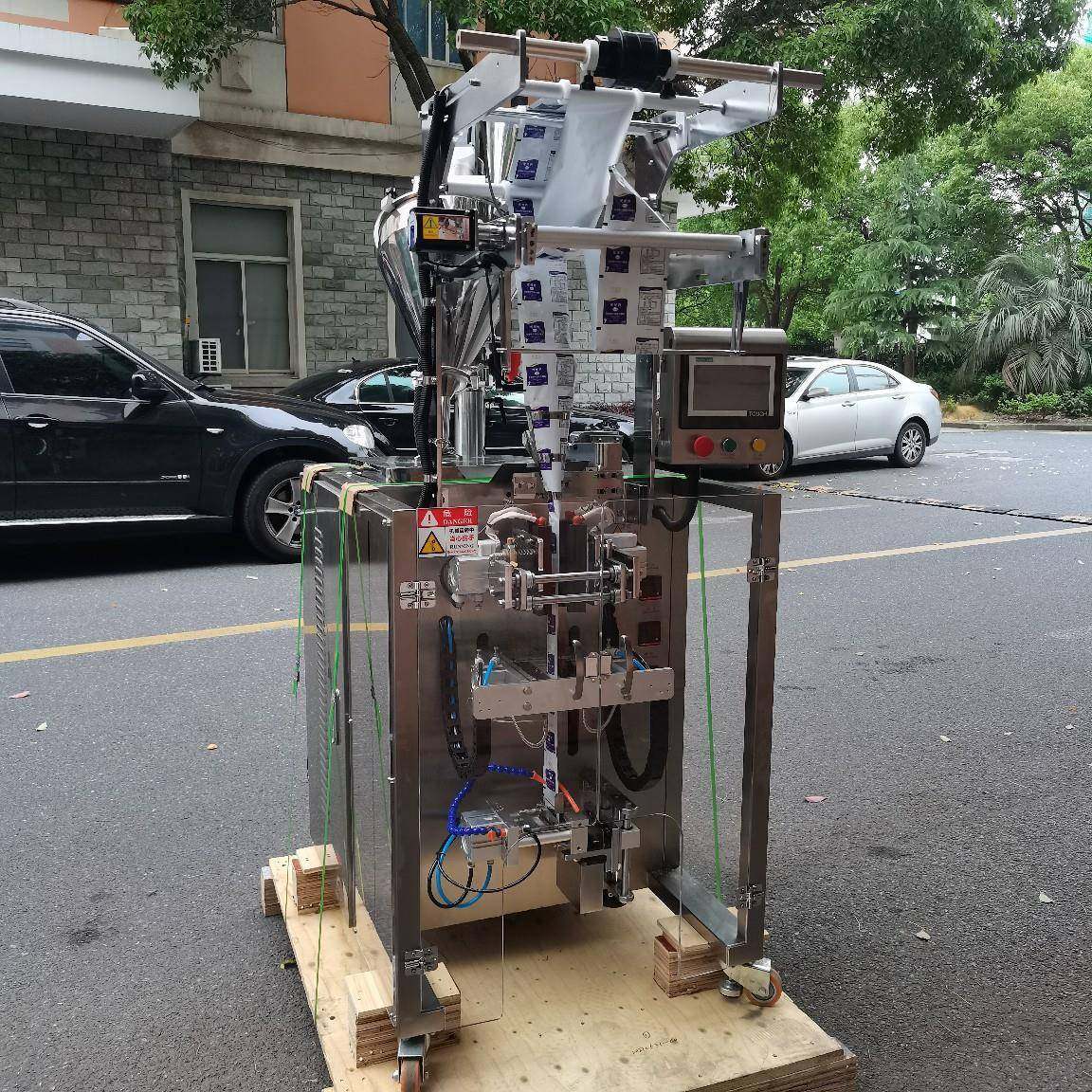 上海立式背封瓜子鱼食饵料包装机江苏超市手抓包膨化食品包装机,淘宝优惠券,粉丝福利购,淘宝优惠卷