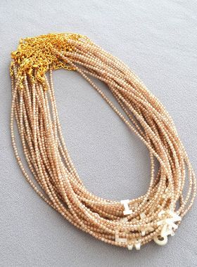 意大利小众品牌唯美浪漫白色母贝英文字母香槟锆石串珠简约项链